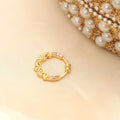 Twisted Gold Plated AD Nose Pin