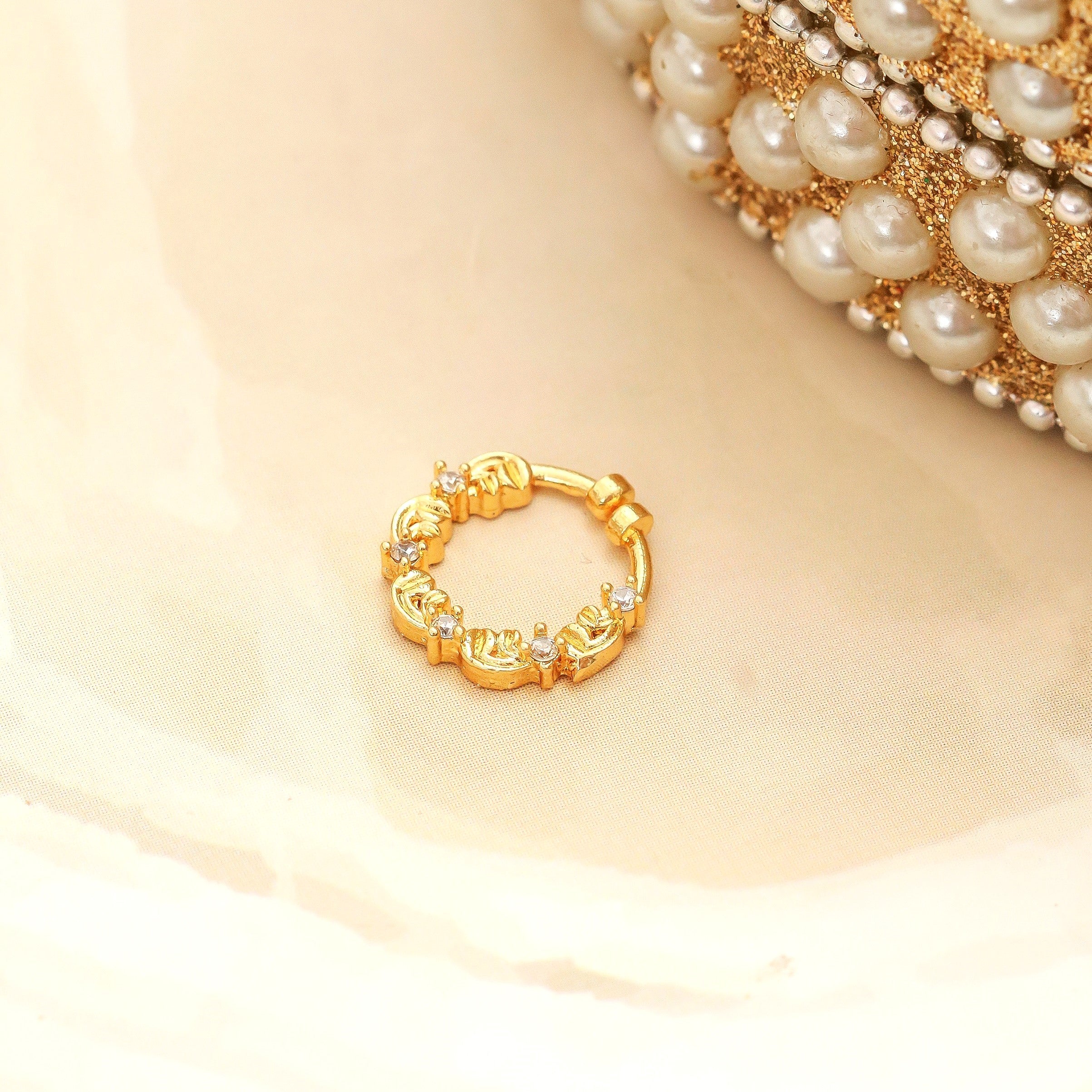 Floral Motif Hoop Gold Plated AD Nose Pin