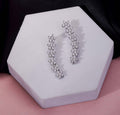 Rhodium Plated Floral Cluster Crystal Ear Cuffs
