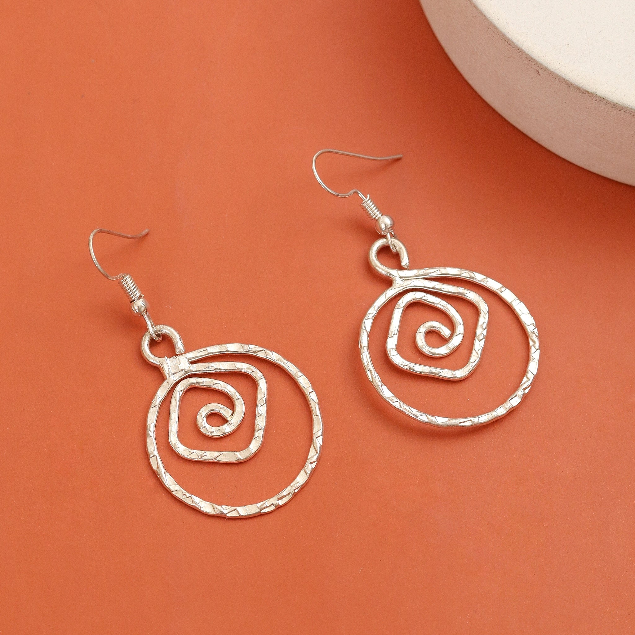 Rhodium Plated Spiral Drop Earrings with Textured Swirl Pattern