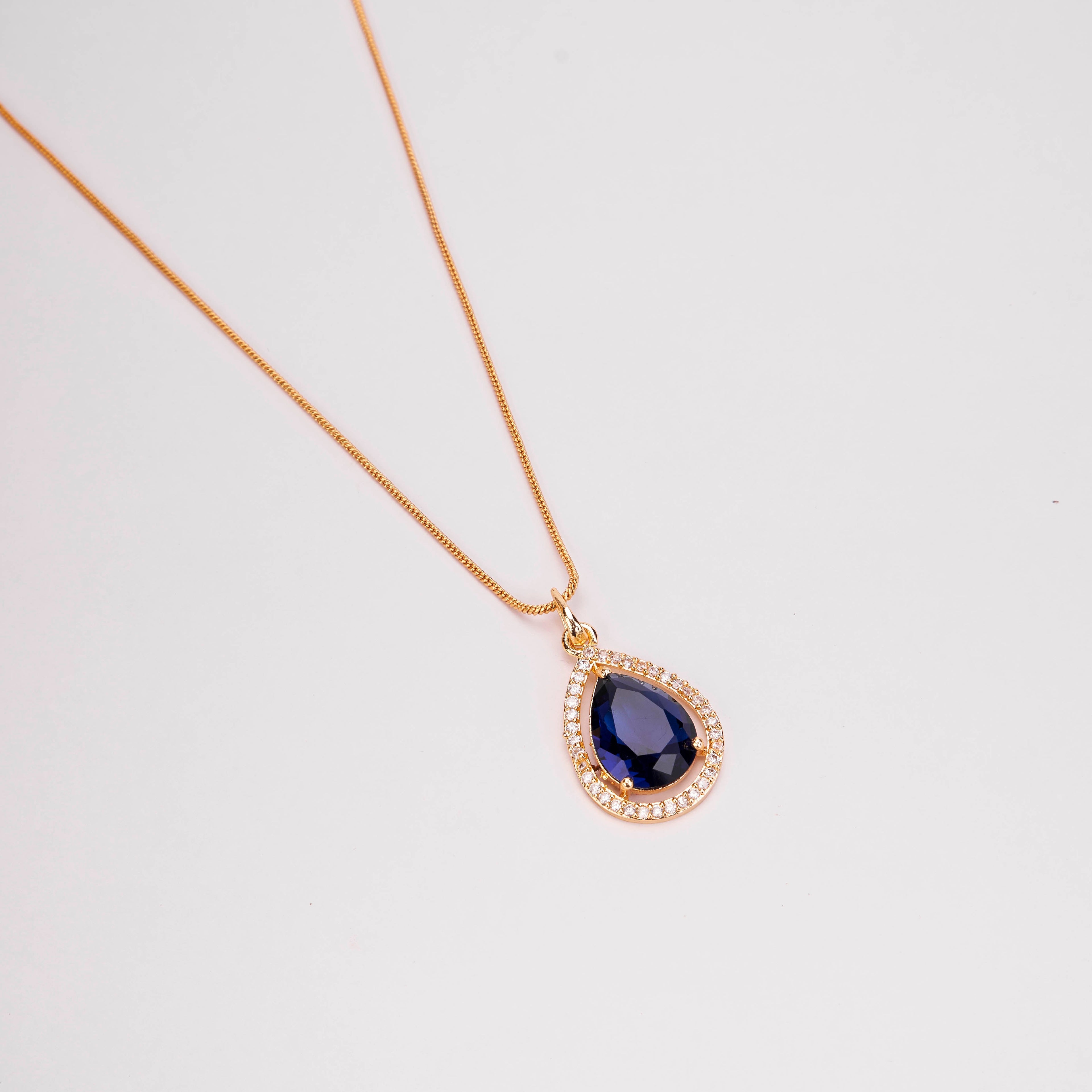Oval Shape Gold Plated Pendant with chain-Crystal Blue