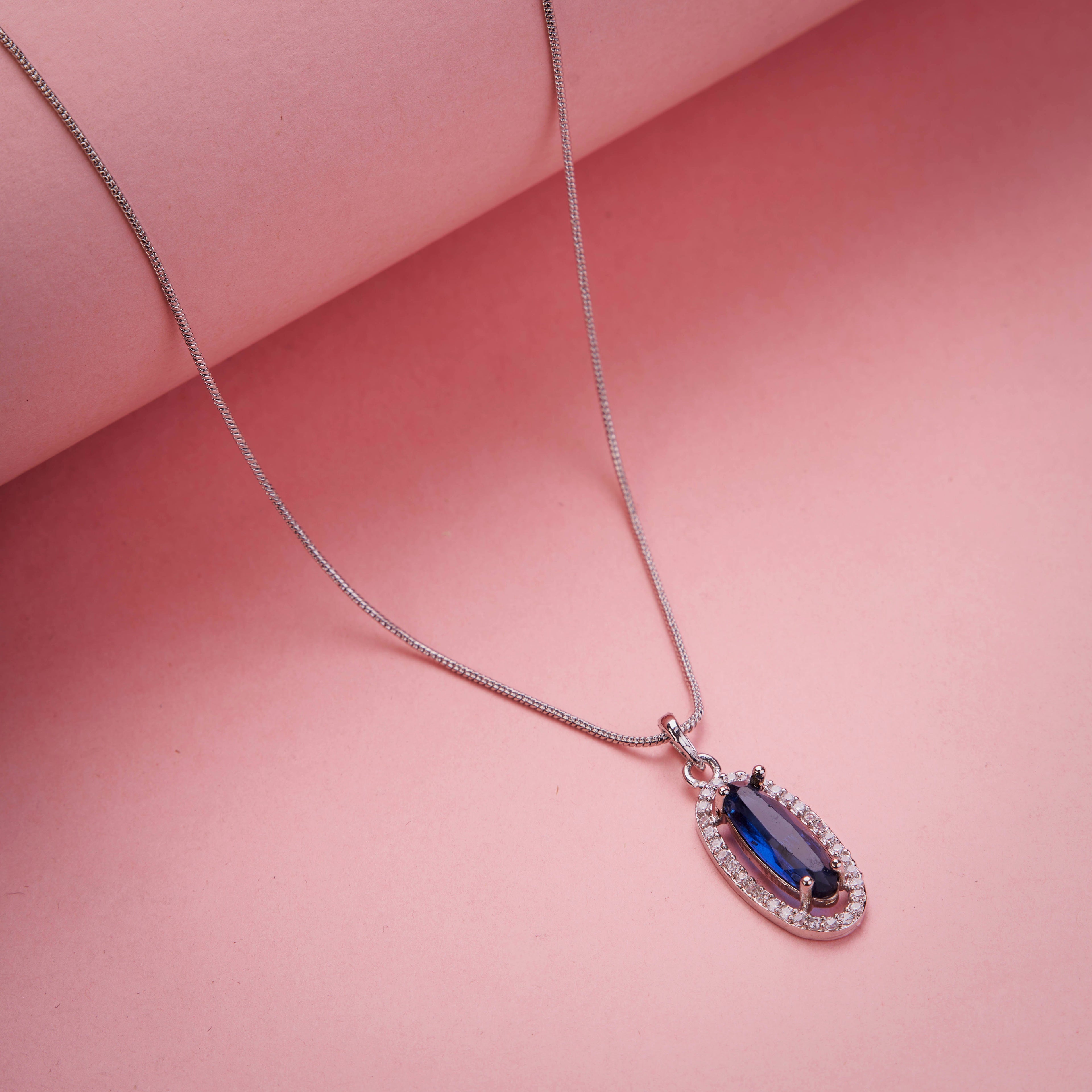 Elongated Oval Halo Design Rhodium Plated Pendant with chain-Crystal Blue
