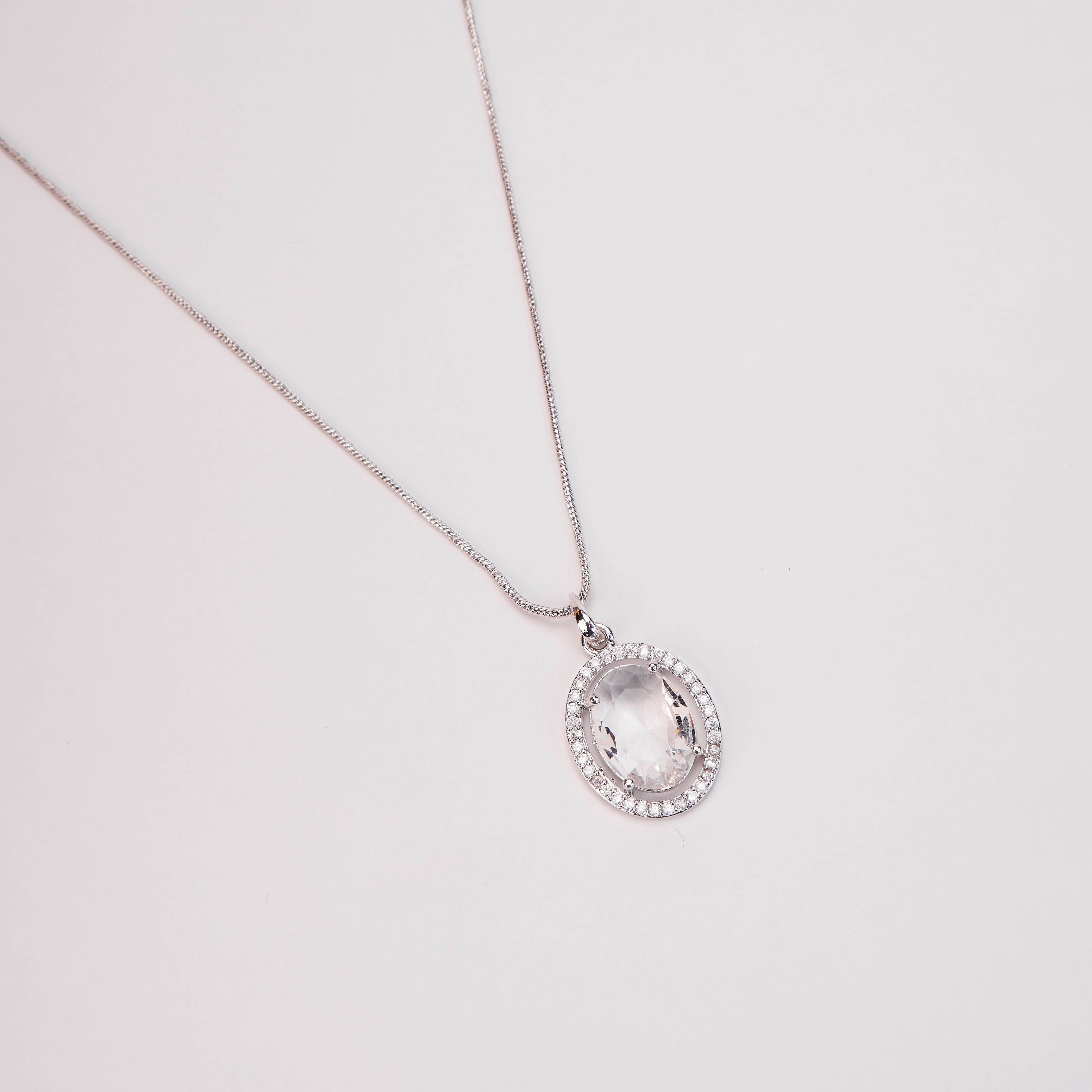 Oval Halo Design Rhodium-Plated Pendant with chain