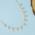 Gold Plated American Diamond Charm Necklace with Dangling Drop Charms
