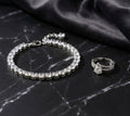 Tennis Bracelet with Round-Cut Stones & Solitaire Ring