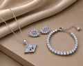 Rhodium Plated Baguette CZ Pendant Necklace, Bracelet & Earrings Jewelry Set