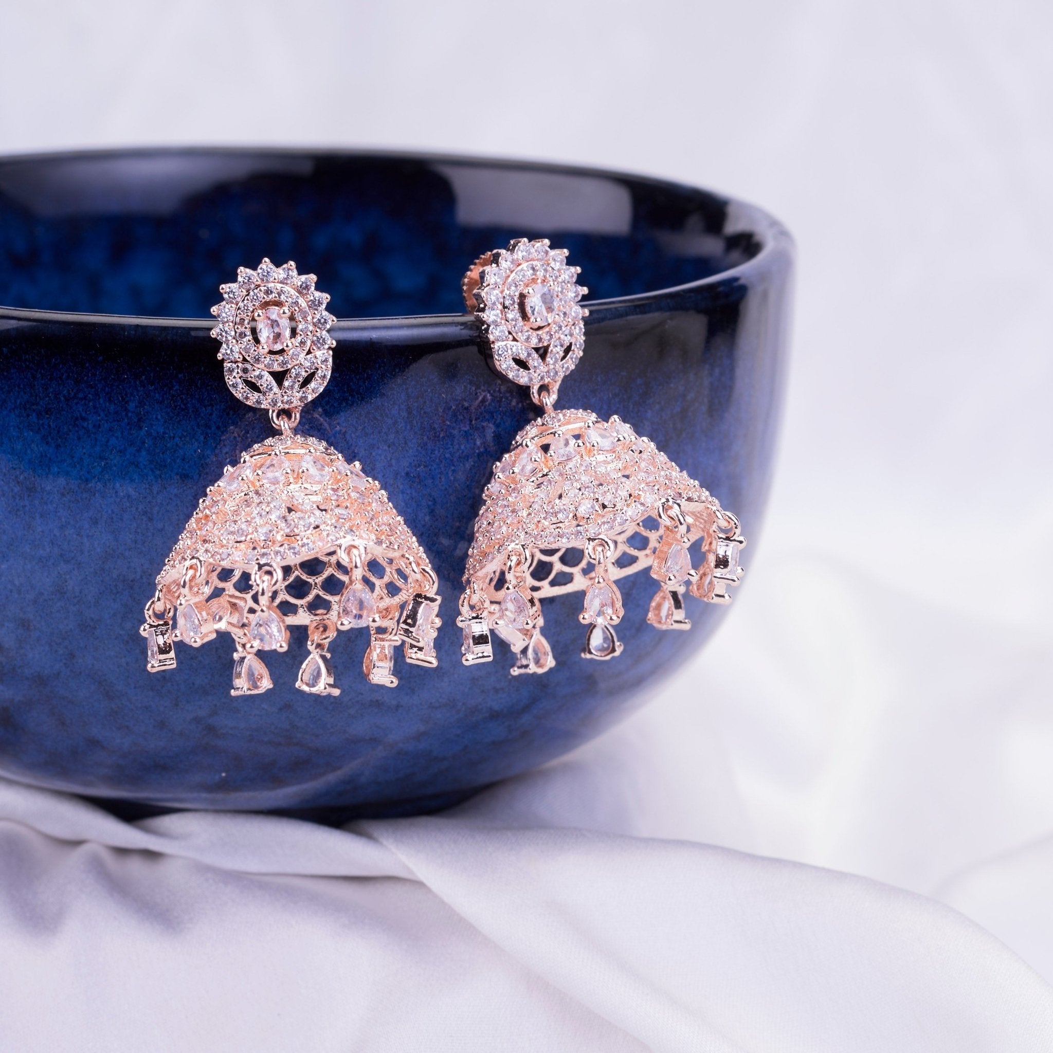 Rose Gold Plated American Diamond Oval Floral Filigree Jhumka Earrings