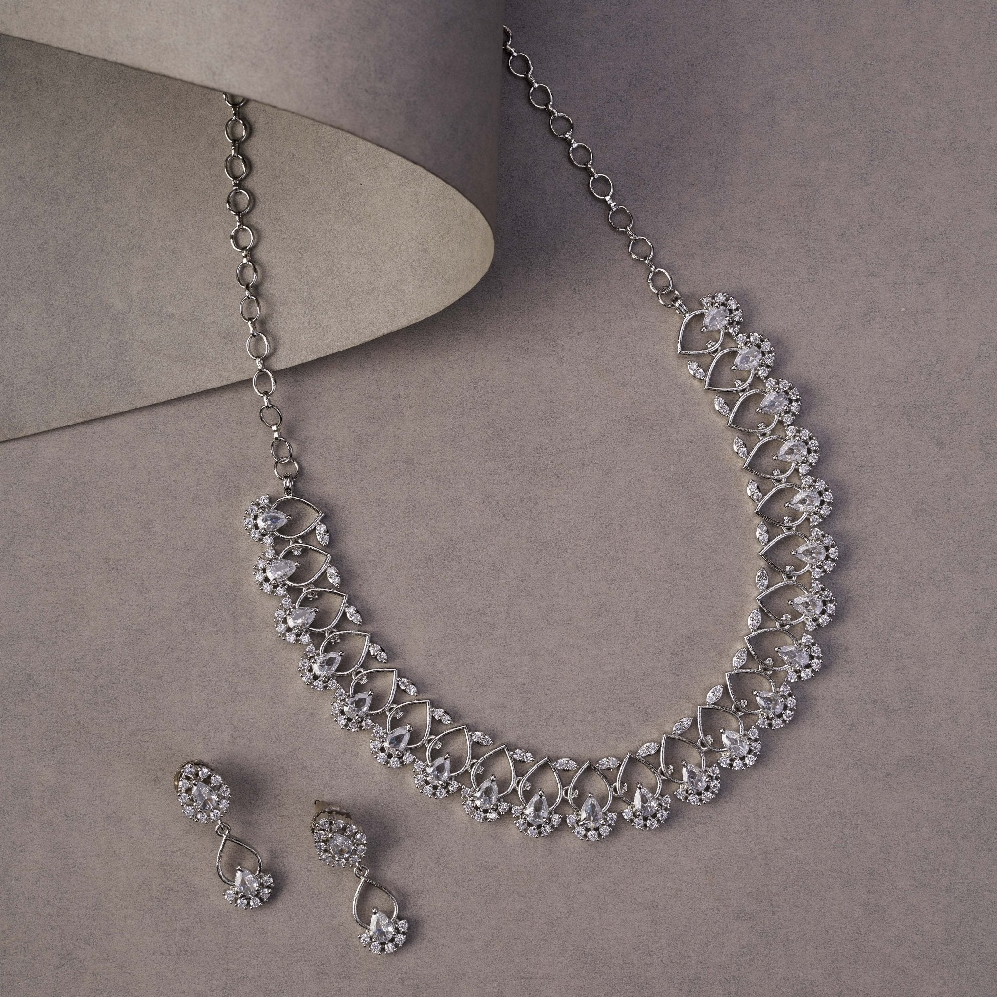 Elegant Emarald Floret Rhodium Plated Necklace Set