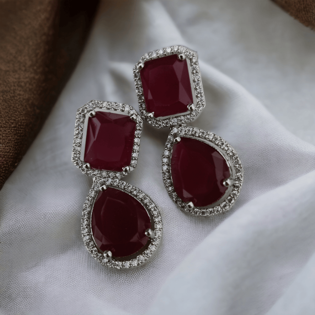 Rhodium Plated Emerald Cut & Pear Cut Amber CZ Stone Drop Earrings