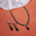 Rhodium Plated Emerald Green American Diamond Necklace Set with Teardrop Pendant & Matching Earrings