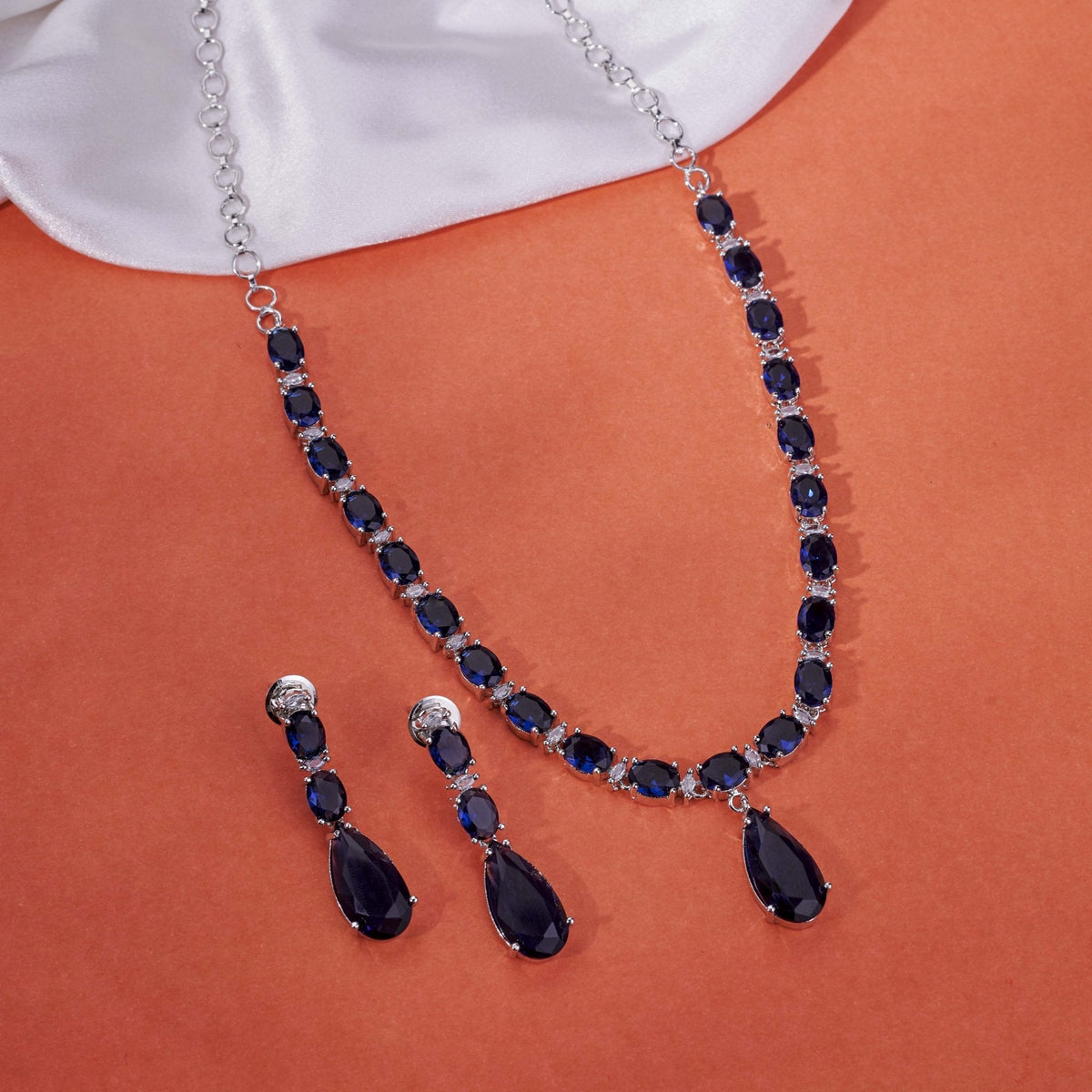 Rhodium Plated Emerald Green American Diamond Necklace Set with Teardrop Pendant & Matching Earrings