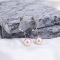 Rhodium Plated Curved Leaf Pearl Drop Earrings