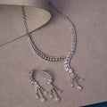 Radiant Rhodium-Plated Necklace Set with Sparkling Teardrop