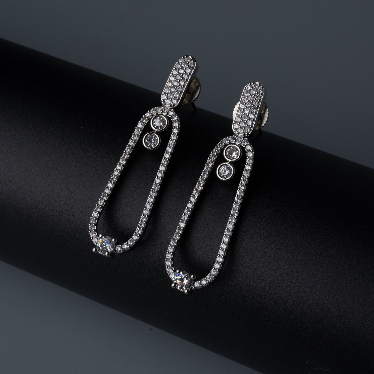 Rhodium Plated Pave American Diamond Oval Drop Earrings